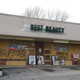 Boarded beauty supplies store on West Florissant Avenue.